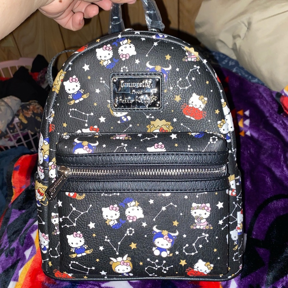 Hello kitty zodiac loungefly